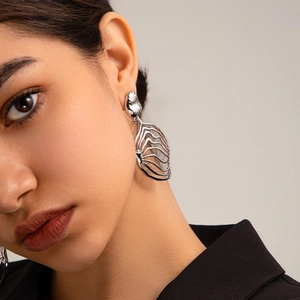 Elegant 18K gold brass leaf drop earrings with wavy hollow design for women