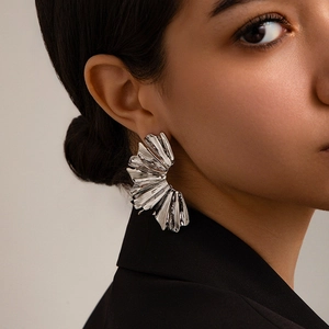 Statement silver fan-shaped pleated metal stud earrings for women in modern avant-garde style