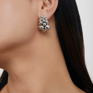 Silver grape cluster spherical earrings featuring polished metallic balls in a C-shape