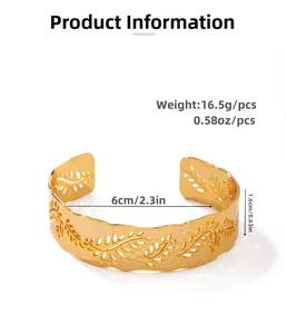 Detailed macro view of 18K gold plated hammered texture and hollow leaf patterns on the cuff