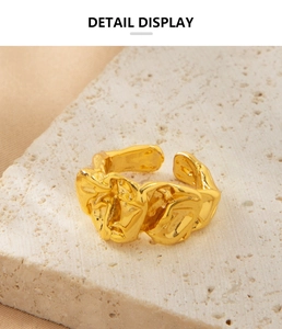 Detailed macro view of 18K gold plated lava texture ring with irregular wavy surface