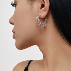 Modern twisted geometric beaded sphere earrings in polished 18K gold plated copper