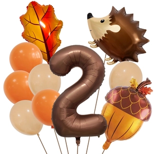 Detail of autumn harvest balloon set featuring hedgehog, maple leaf and number 2