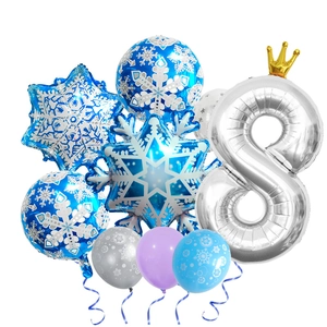 Detail of Christmas snowflake foil balloons and silver number 8 for birthday party decoration