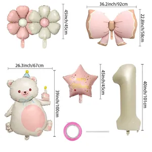 Cream bear and bow foil balloon set with size specs for 1st birthday party decor