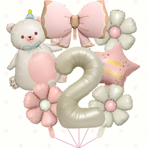 Detail of 2nd birthday balloon set with cream bear, pink bow, and golden number 2 balloon