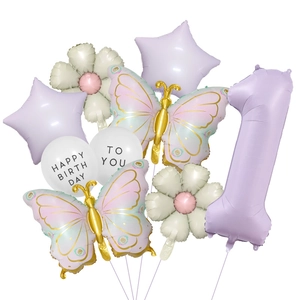 Detailed view of lavender butterfly birthday balloons set with daisy and star shapes