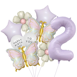 Detail of lavender number 2 foil balloon with butterfly and daisy party decorations