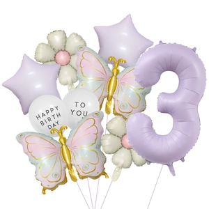 Detail of lavender number 3 balloon with butterfly and daisy theme party decorations