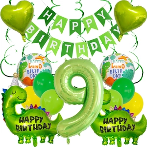 Detail of 9th birthday dinosaur theme party set with balloons and green banners