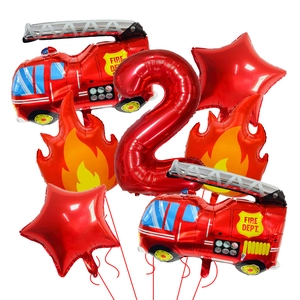 Detail view of fire truck theme balloon set with red number two and flame foil shapes