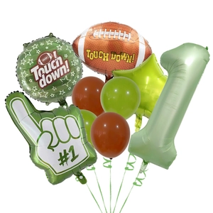 Detail of American football foil balloon set with stars and numbers for birthday party decor