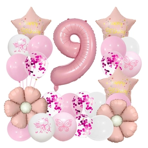 Detail of 9th birthday balloon set with pink number 9 and butterfly floral patterns