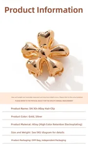 Detailed view of golden alloy flower hair claw with durable electroplating finish