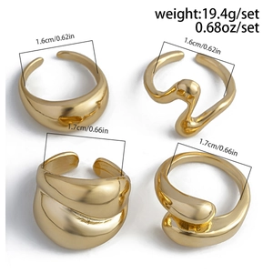Detail of four-piece gold geometric liquid metal rings set with diameter measurements