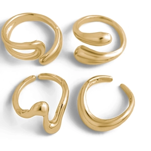 Set of four gold irregular geometric rings with modern molten liquid metal texture design
