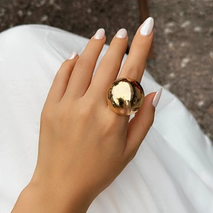 Minimalist oversized golden semi-round metal ring with high-shine mirror finish