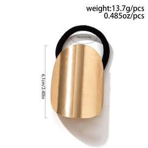 Detail of gold metal ponytail cuff with dimensions 6.1cm and 13.7g weight on white background