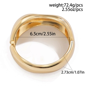 Detailed specs of gold teardrop cuff bracelet with 6.5cm diameter and 72.4g weight