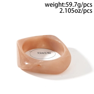 Detail of pink resin square bangle with smooth texture and interior diameter dimensions