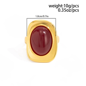 Detail showing 1.8cm width and 10g weight of retro gold ring with oval red gemstone