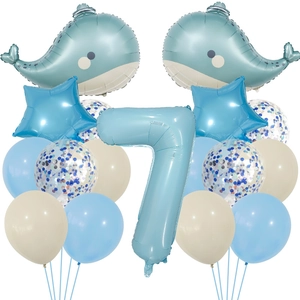 Detail of ocean-themed birthday balloon set with blue whale and number 7 foil balloons