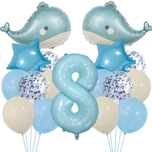Detail of whale foil balloons and blue latex balloons for an 8th birthday party set