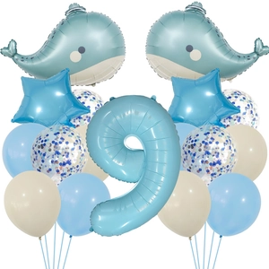 Detail of 9th birthday ocean theme party set with blue whale and foil star balloons