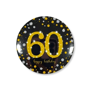 Close-up of 60th birthday badge with gold glitter numbers on black festive background