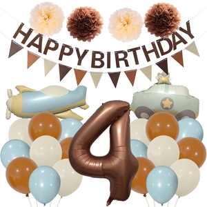 Detail of 4th birthday party set with brown number 4 and airplane foil balloons