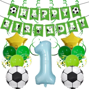 Detail of football birthday party kit with 1st year balloon and soccer themed banners