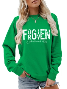 Detail view of FORGIVEN print on a green women's sweatshirt with Ephesians 4:32 text