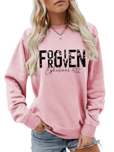 Detail of pink crewneck sweatshirt with black FORGIVEN Ephesians 4:32 print and ribbed cuffs
