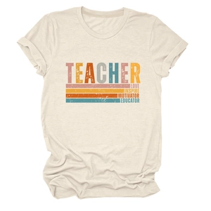 Détail du tissu en coton doux avec imprimé graphique vintage Teacher Love Inspire sur le haut