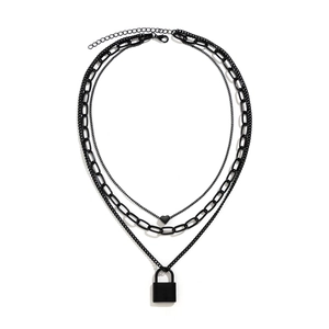 Punk style layered black metal necklace featuring heart and square lock charms