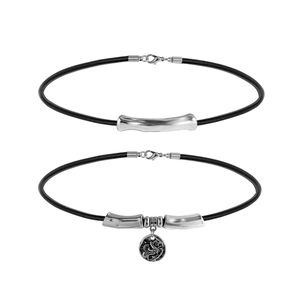 Vintage double-layer black cord necklace set with silver curved tubes and relief pendant