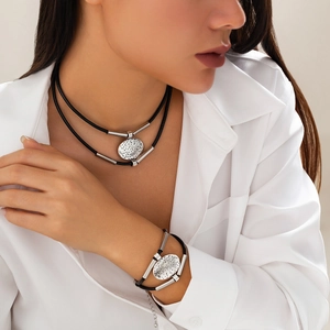 Bohemian double-layer necklace and bracelet set with hammered silver oval pendants