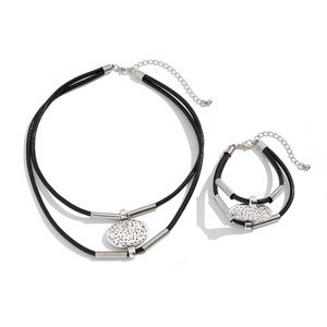 Minimalist double-layer black cord necklace and bracelet set with silver hammered pendants