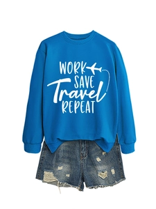 Flat lay of royal blue sweatshirt with WORK SAVE Travel REPEAT text and denim shorts