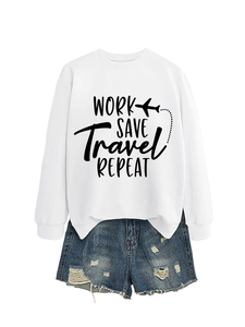 Close-up of white crew neck sweatshirt with WORK SAVE TRAVEL REPEAT print and denim shorts