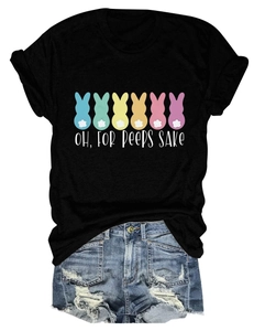 Detail of colorful Easter peeps bunny print on black short sleeve t-shirt with denim shorts