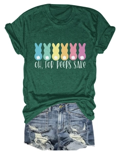 Detail of dark green t-shirt with bunny print and distressed denim shorts outfit set