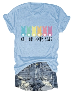 Detail of the crew neck blue t-shirt and distressed denim shorts with bunny graphic