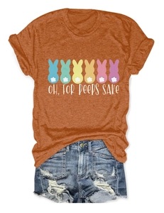 Close-up of six colorful bunny graphics and 'OH FOR PEEPS SAKE' text on an orange t-shirt