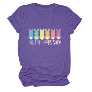 Detail of soft purple crew neck t-shirt featuring colorful Peeps bunnies and white text