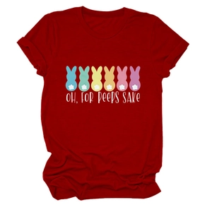 Detail of red cotton Easter t-shirt featuring colorful bunnies and typography print
