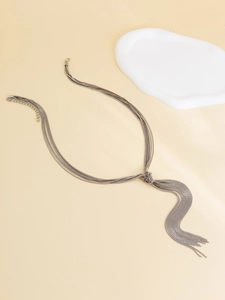 Detail of silver multilayered tassel necklace with adjustable lobster clasp and extension chain