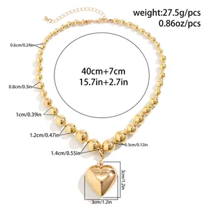 Detailed size chart for chunky gold bead necklace with heart pendant and dimensions