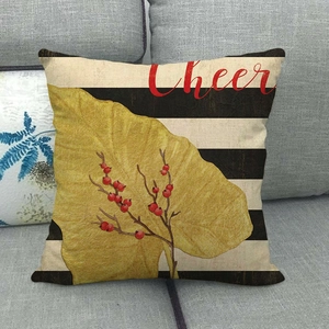 Linen pillowcase with golden leaves, red berries, and Cheer text on a striped background