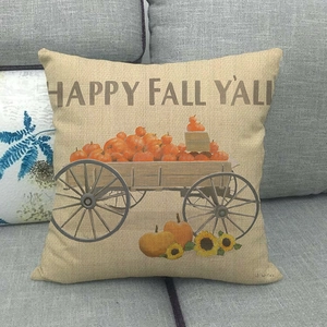 Detail of Happy Fall Y'All linen pillowcase with pumpkin and sunflower harvest graphics